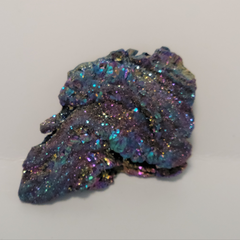 Aura coated crystal